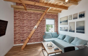 Starołęcka Apartment with Mezzanine